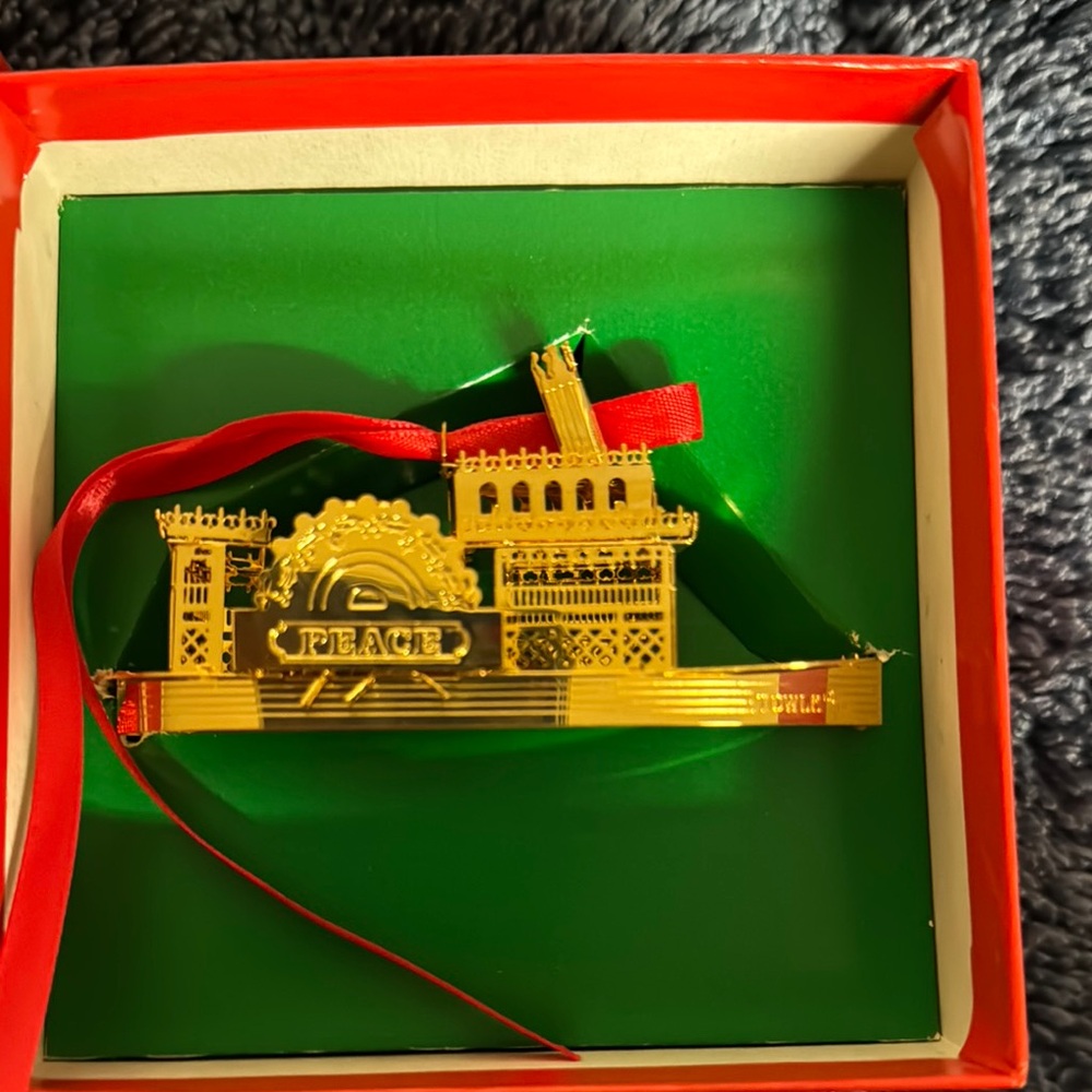 Towle River Boat Gold Peace Ornament